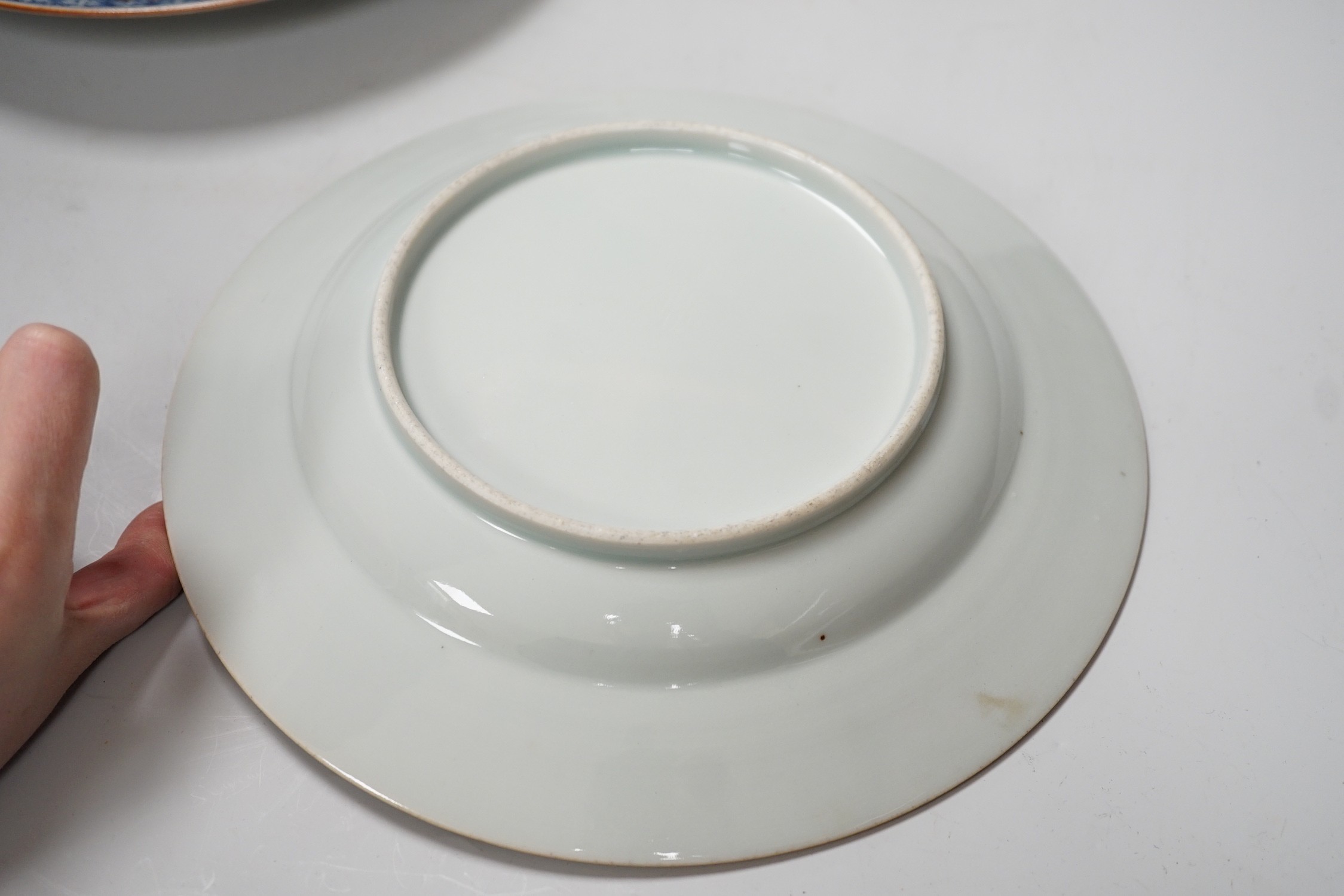 Three English pearlware blue and white bowls and two Samson plates